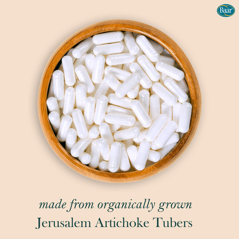 Capsules arranged beside bottle