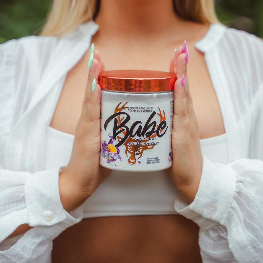 Lifestyle image of a woman exercising with Babe Pre Workout