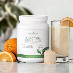 Preparing Balance Complete shake in a glass