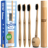 Four bamboo charcoal toothbrushes with a travel case