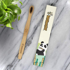 Charcoal-infused soft bristles on a kid-sized toothbrush