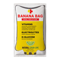 Banana Bag Oral Solution packets lemon-lime in glass for easy daily hydration