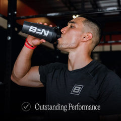 Bare Performance Nutrition black bottle with flip-cap lid demonstrates secure closure during workouts