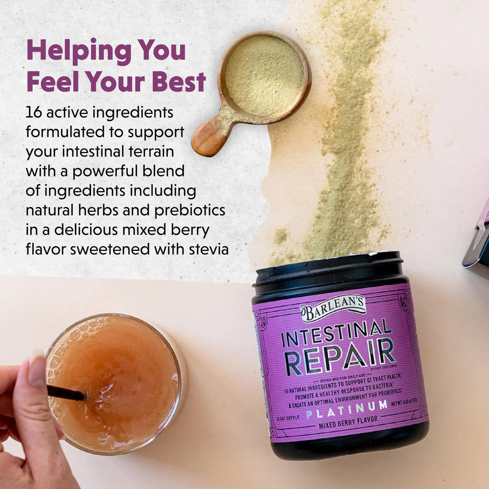 Powder being mixed into a glass for a mixed berry drink