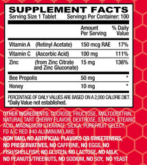 Single cherry lozenge with white background