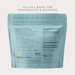 Serving scoop in a shaker beside the TRU bottle