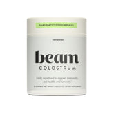 Beam Colostrum Powder bottle label with 3g serving claim and grass-fed source
