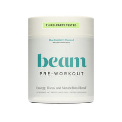 Beam Pre Workout powder being poured for jitter-free energy during training.