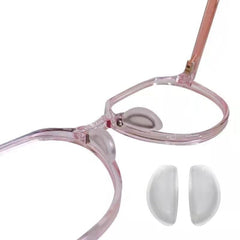 BEHLINE plug-in eyeglass nose pads, clear silicone, front view