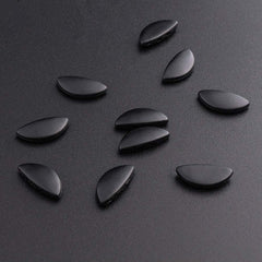 Anti-slip nose pad sitting on eyeglass frame