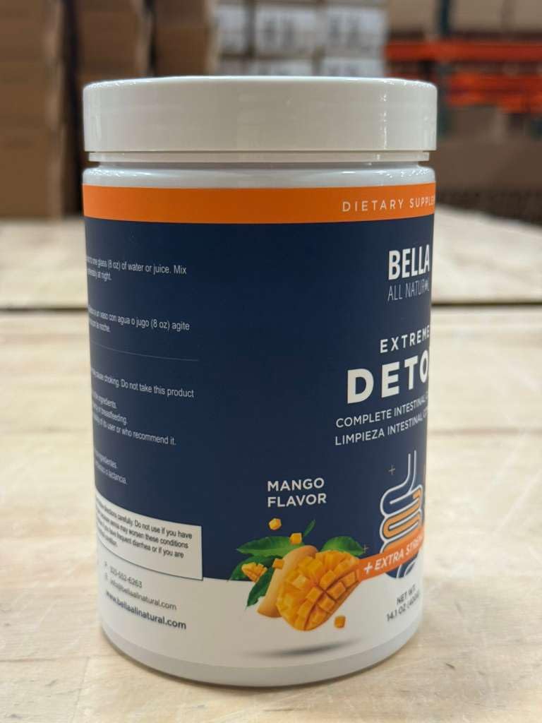 Jar of detox powder Mango with measuring scoop