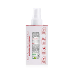 Athlete applying spray for muscle relief