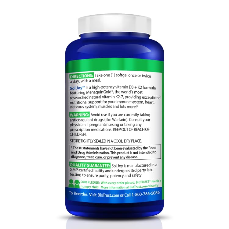 Lifestyle shot of Sol Joy bottle with glass of water