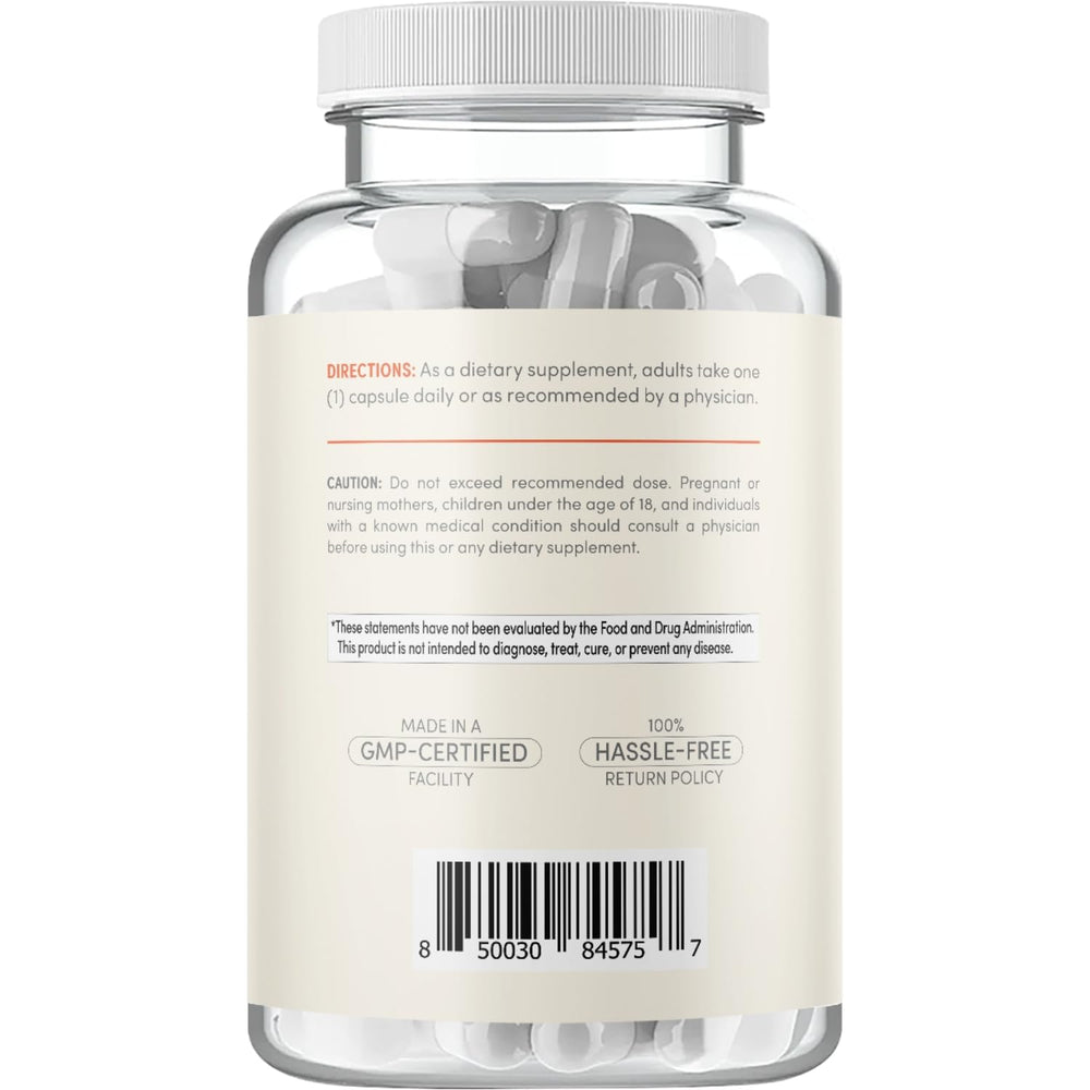 Capsule and bottle arranged on white background