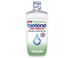 Biotene Moisturizing Oral Rinse Mild Mint 16 oz bottle front