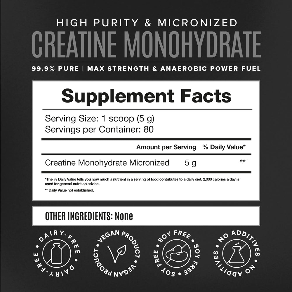 Creatine powder being mixed into a shaker bottle