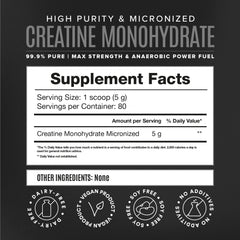 Creatine powder being mixed into a shaker bottle