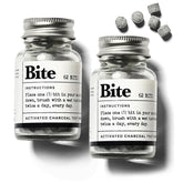 Bite Whitening Toothpaste Tablets Mint Charcoal packaging with two glass refill bottles