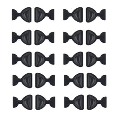 Close-up of black butterfly adhesive silicone eyeglass nose pads