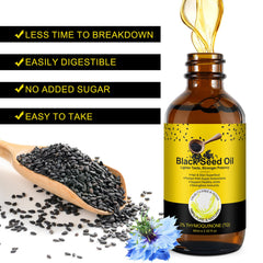 Black seed oil being dispensed from bottle