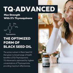 Close-up of a single 500 mg black seed oil softgel capsule