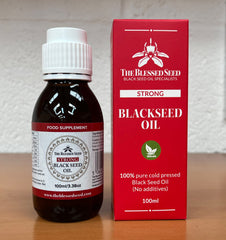 Amber bottle with no-drip spout for The Blessed Seed Black Seed Oil