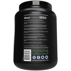BLESSED vegan protein packaging closeup shows 30 servings and GMP-quality manufacturing.