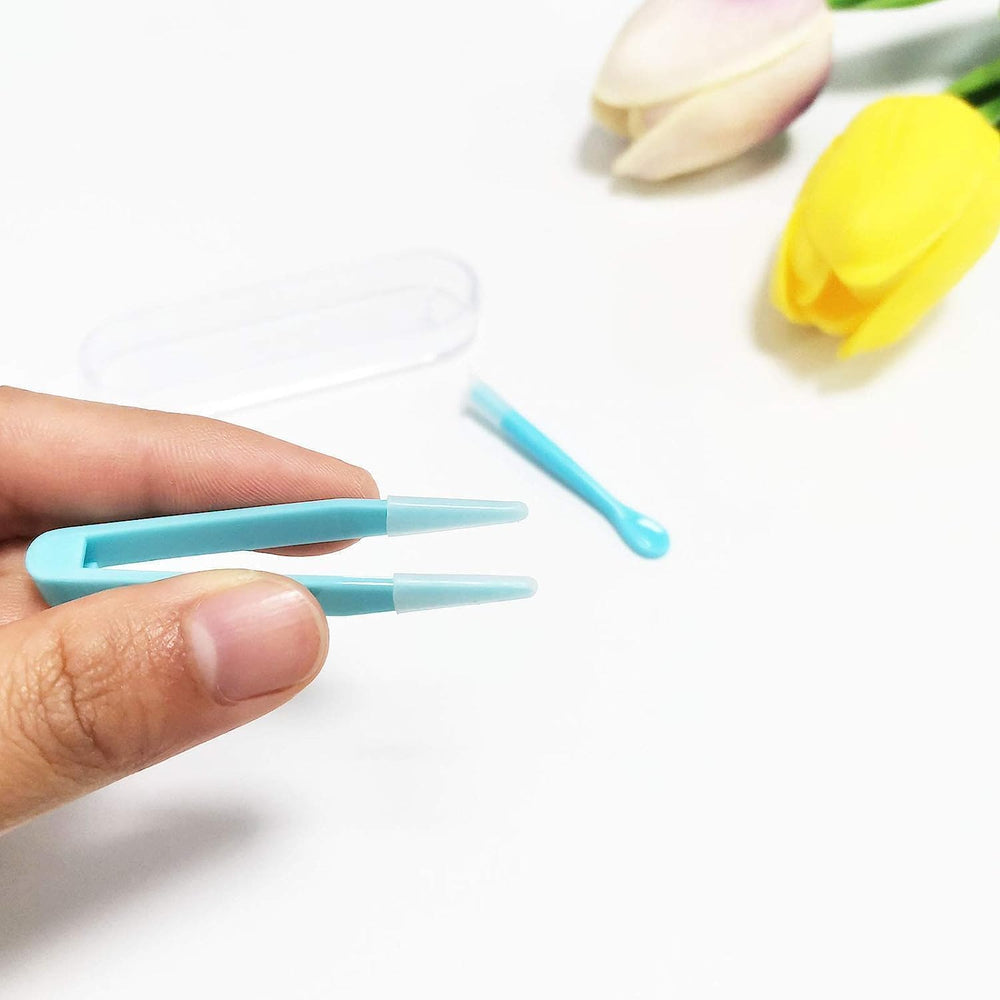 Precision tweezers and lens remover tool in blue kit