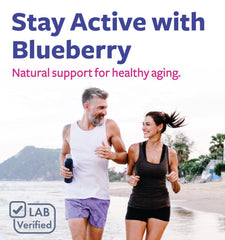 Vegan Non-GMO blueberry extract capsules on white background