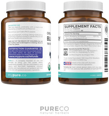 Healthy adult taking a blueberry extract capsule