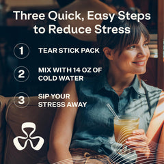 Stick being stirred into a glass of water