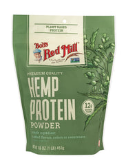 Scoop of hemp protein powder with powder texture