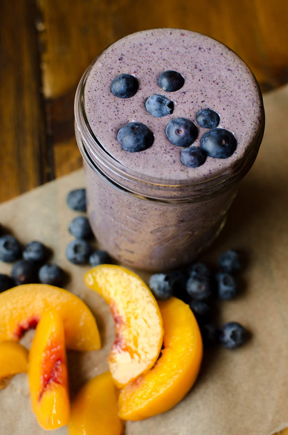 Bob's Red Mill hemp protein powder being poured into a smoothie for quick protein.