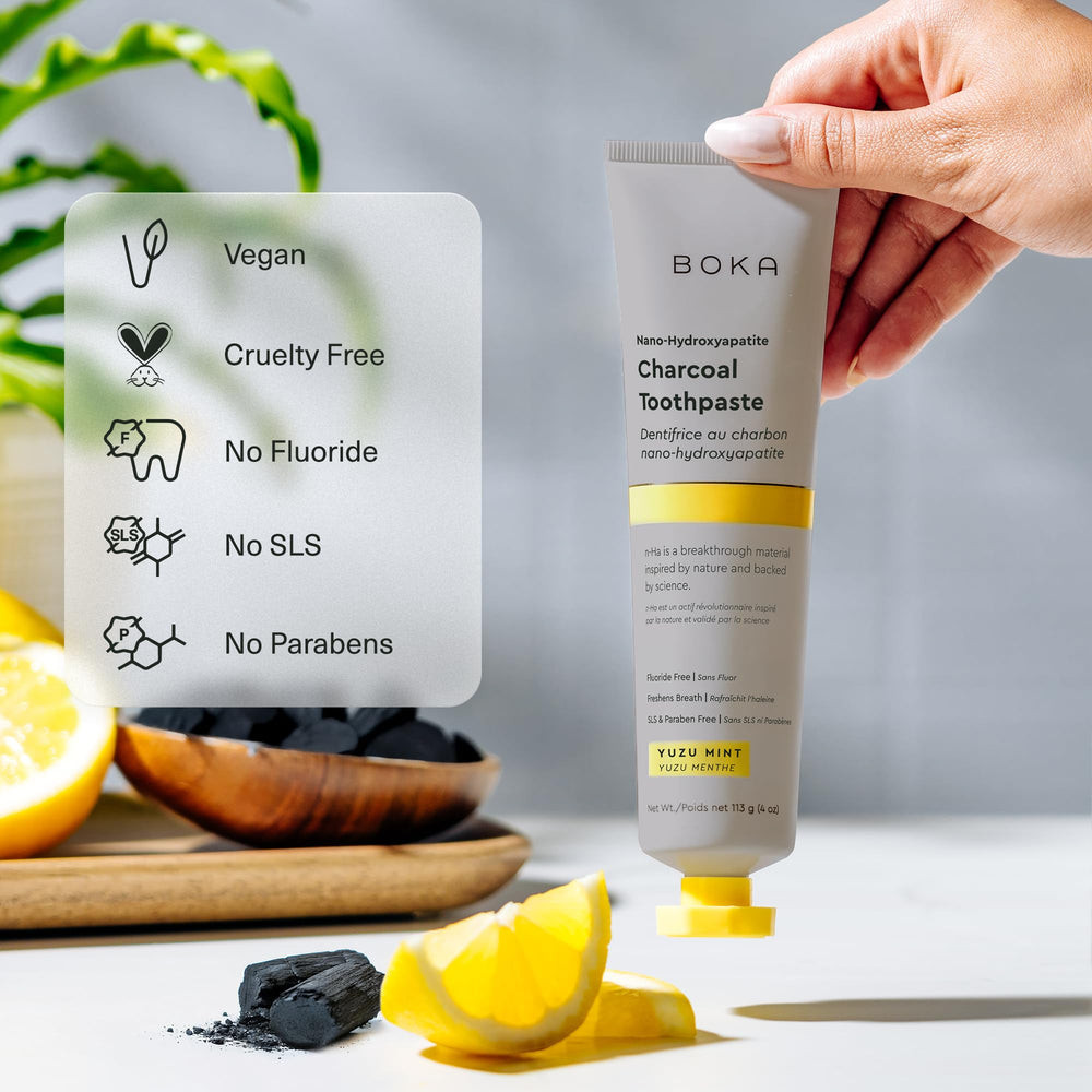 Front packaging of Boka fluoride-free toothpaste showing charcoal Yuzu Mint branding