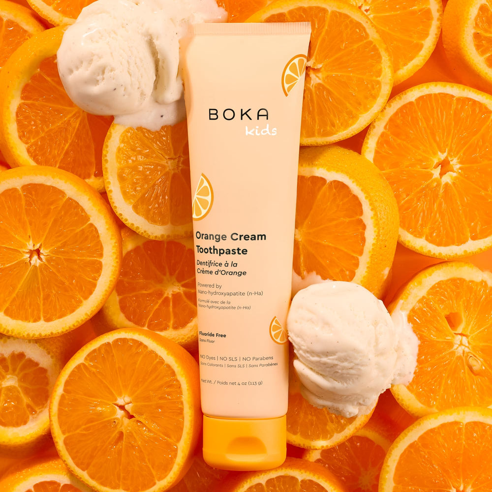 Orange Cream flavored Boka toothpaste tube and cap