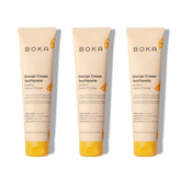 Packaging of Boka fluoride-free toothpaste orange cream 4 oz 3-pack