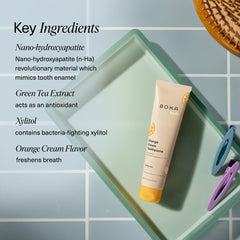 Child brushing with Boka Orange Cream toothpaste