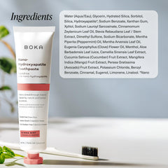 Lifestyle shot of two toothpaste tubes for US-made pack