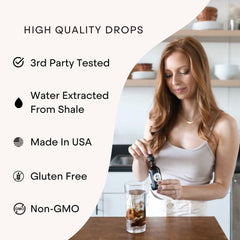 Bottle with glass of water to illustrate hydration