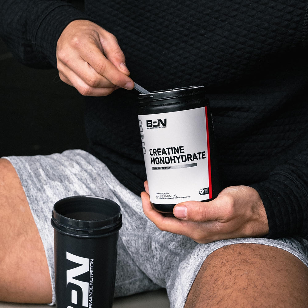 Athlete training with BPN Creatine Monohydrate during workout