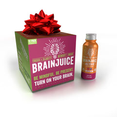 BrainJuice Active shot bottle with pomegranate acai flavor for quick focus.