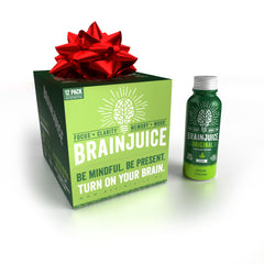 BrainJuice shot bottle closeup highlighting focus-boosting formula for sharp thinking