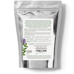 Brewing alfalfa leaf tea in a cup