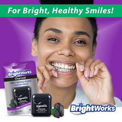 Gums gently stimulated while flossing with mint charcoal floss