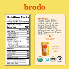 Organic chicken bone broth with turmeric and ginger close-up