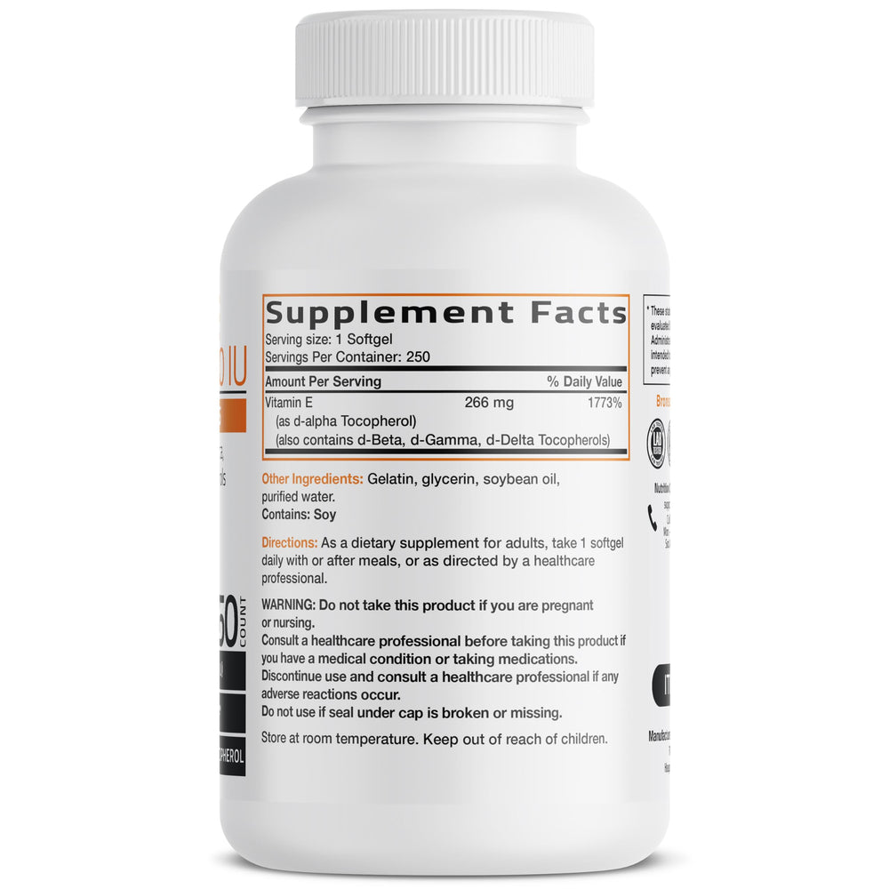 Natural Vitamin E 400 IU softgels arranged on white background