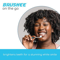 Person brushing teeth on the go with Brushee