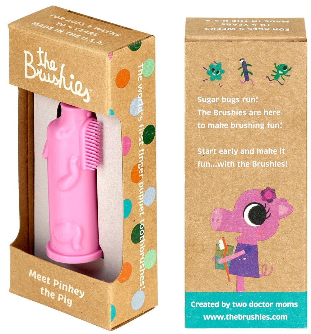 Brushies Pinkey the Pig toddler toothbrush displayed on white background