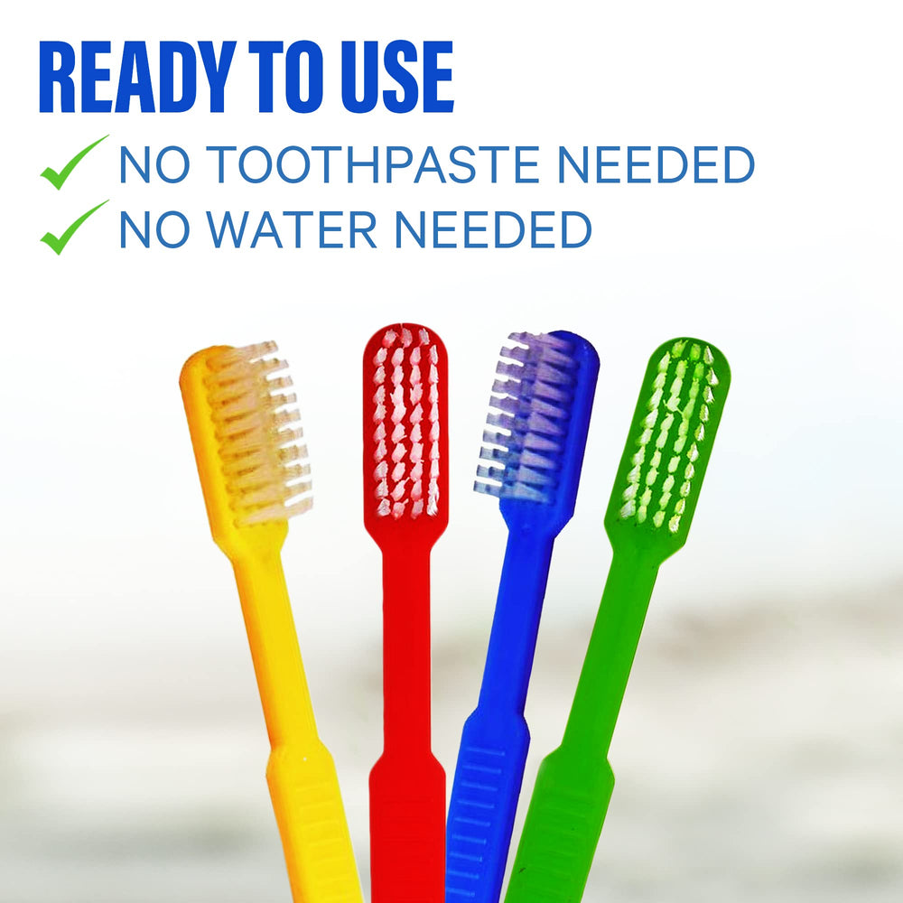 Close-up of mint toothpaste pre-applied to a disposable toothbrush.