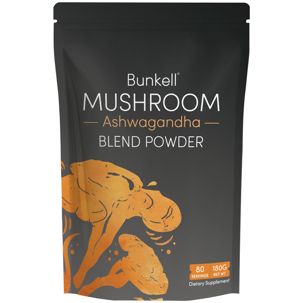 Serving spoon with mushroom powder and prepared drink